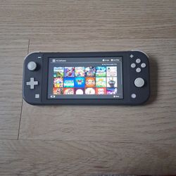 Nintendo Switch Lite w/ games