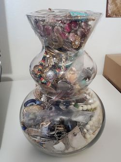 Glass Vase Stuffed Full of Jewelry