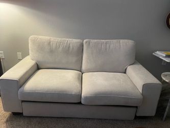 Modern white loveseat