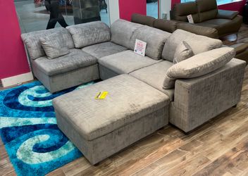 Spring Blowout Sale. Lima Grey Sectional With Ottoman Only $899. Easy Finance Option. Same-Day Delivery.