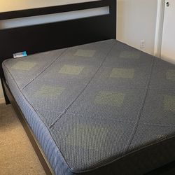 Black wood frame queen bed and mattress 