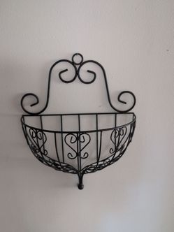 Ornamental black metal plant hanger