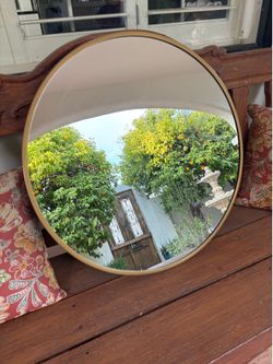 Round mirror 27x28 inches