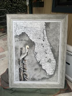 Brand new framed Florida map with Pelican