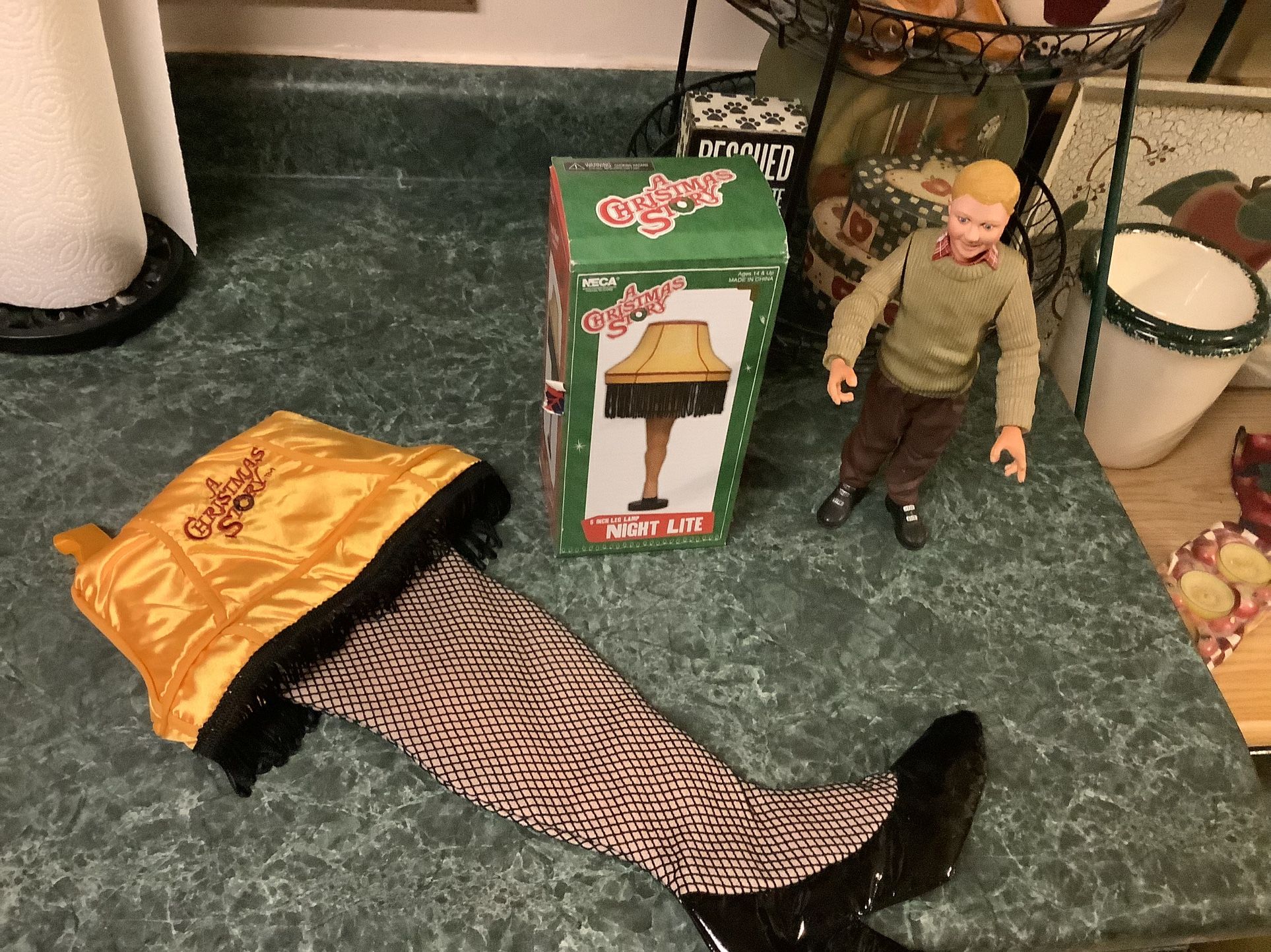 A Christmas Story Package Including Christmas Story 10" Talking Ralphie Doll Action Figure, Night Light Famous Leg And Christmas Stocking 