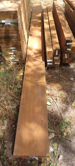 Pressure treated lumber. 2x12x18 ft long two available at $20 each