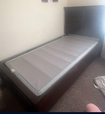 Twin wooden bed