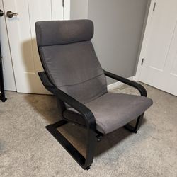 IKEA Poang Armchair With Foot Rest. Black Frame And Gray Cushion. Used