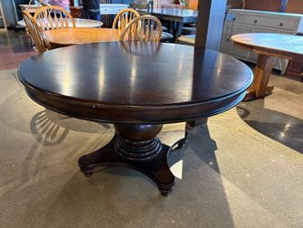 Dark Wooden Circular Pedestal Dining Table