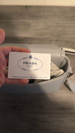 Light gray Prada bag 500 or best offer cash only meet up At my home! Authentic with stamp and Prada is card ! Brand new used once ! Perfect condition 