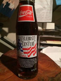 1989 Coca cola bottle from South Dakota, unopened and full.