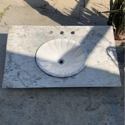 white marble with drop in sink