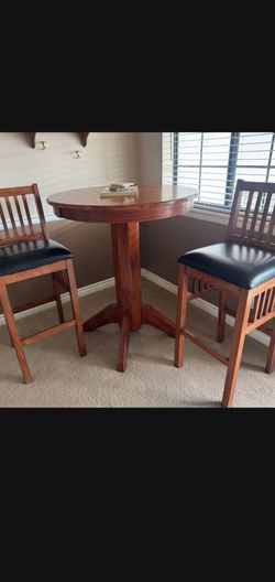Billiard table and chairs The