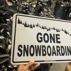 Man cave sign snowboarding  