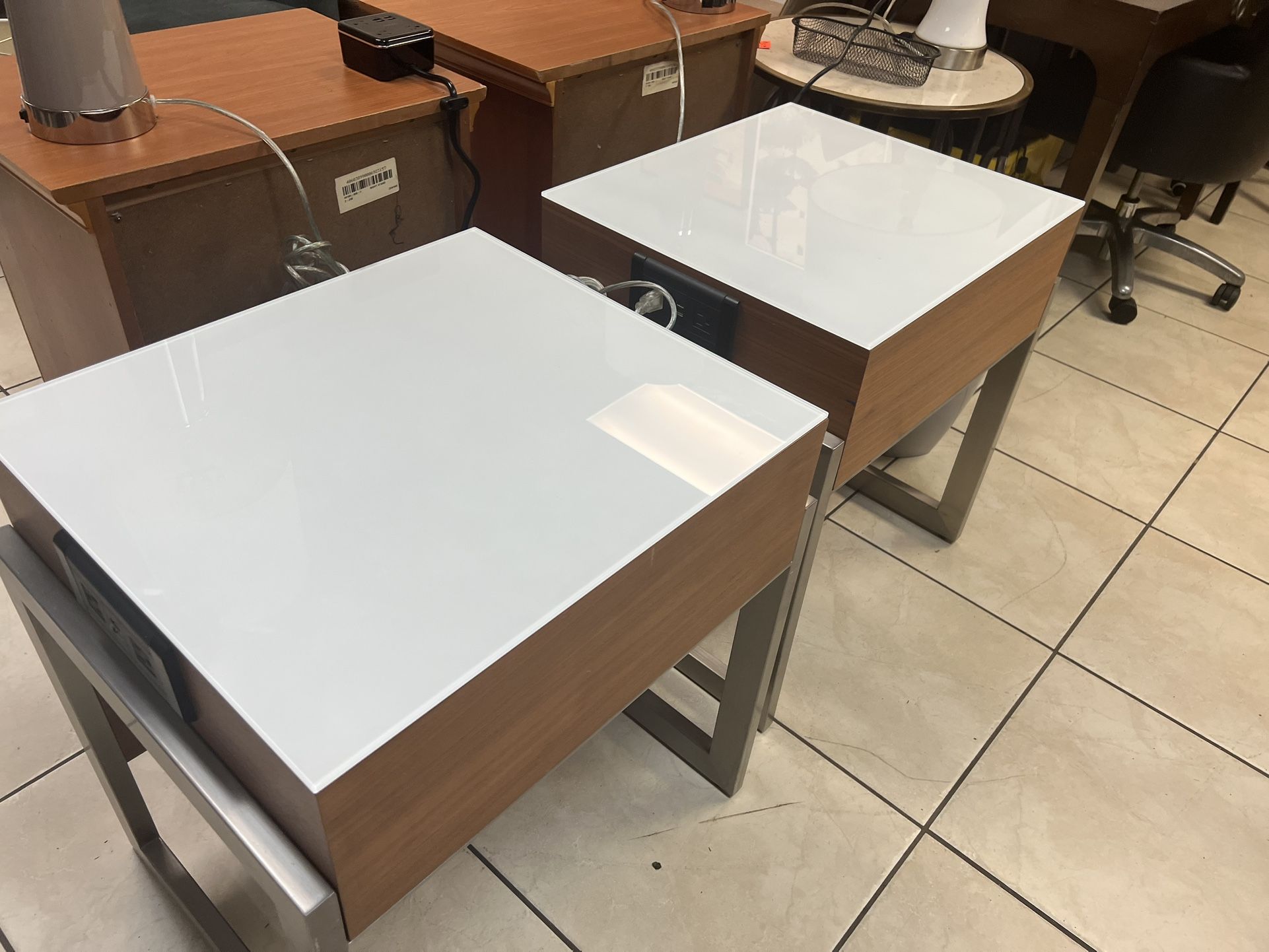 Nightstand with a white top glass