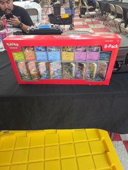 Pokemon Prismatic 8 tin pack costco bubdle