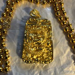 Gold ,999% Pendant And Necklace 