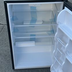 Brand new mini refrigerator worth 240