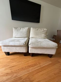 2 matching ivory accent chairs