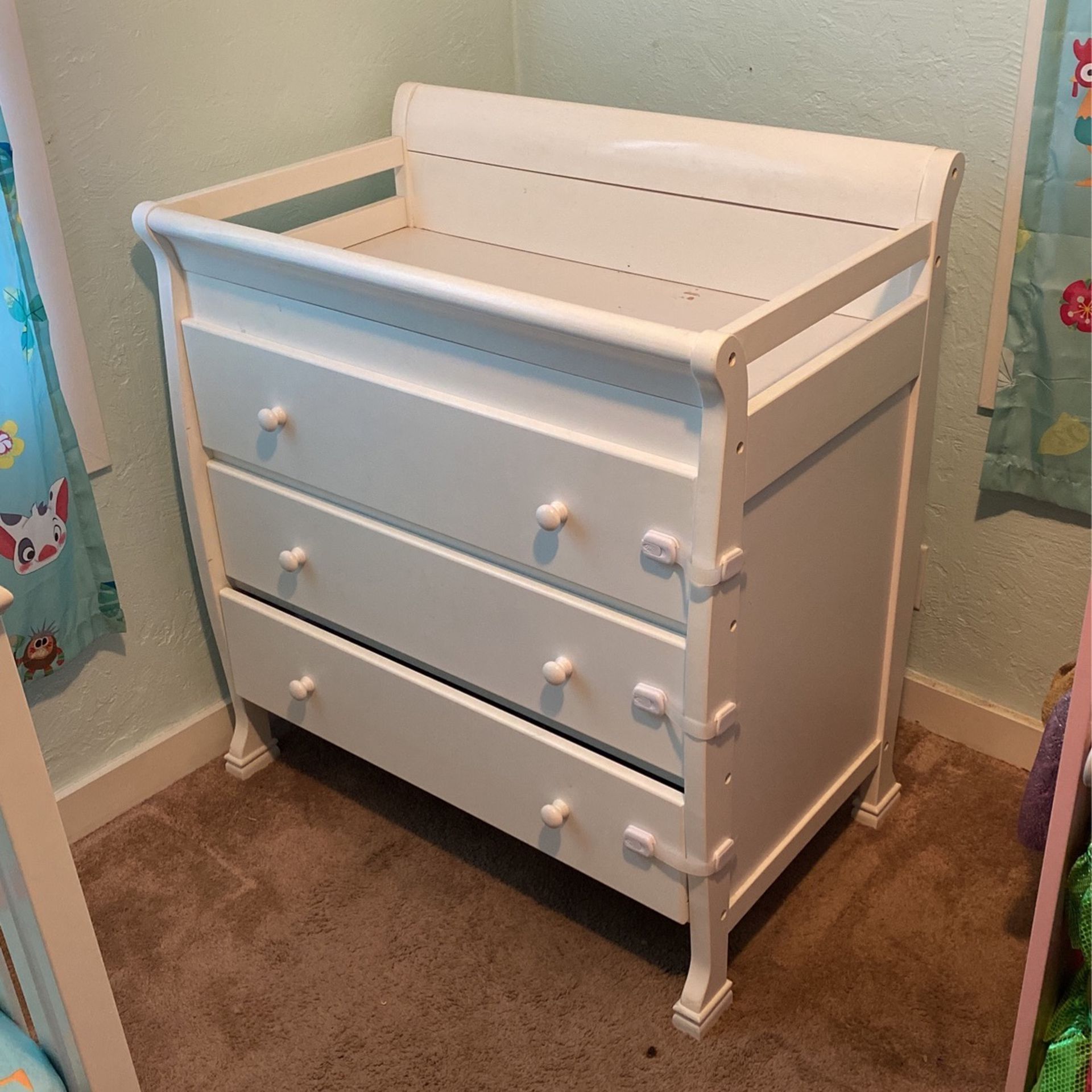 Crib and dresser With Matters