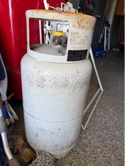 Large propane tank , forklift