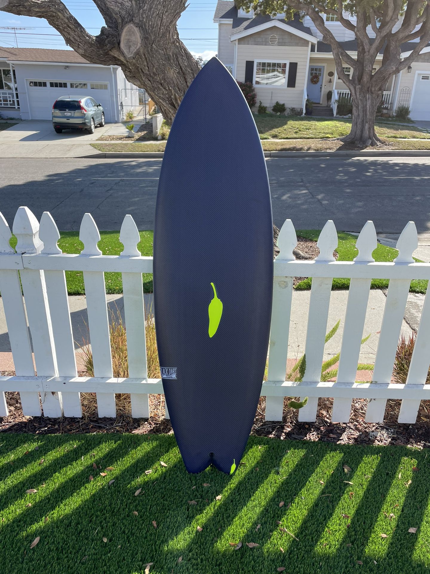 Chilli Twin Peppa Surfboard in Black Dart 