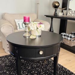 Black Round  Table with Gold Tipped Legs 28’W x 22’Tall