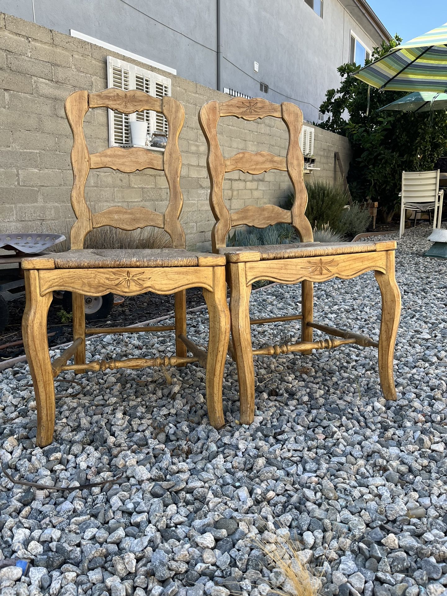 Pair a farm style rustic Rush seated chairs