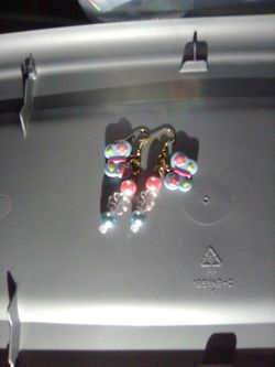 Homemade bead and charm earring