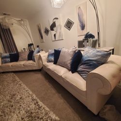 2 Identical White Leather Love Seats
