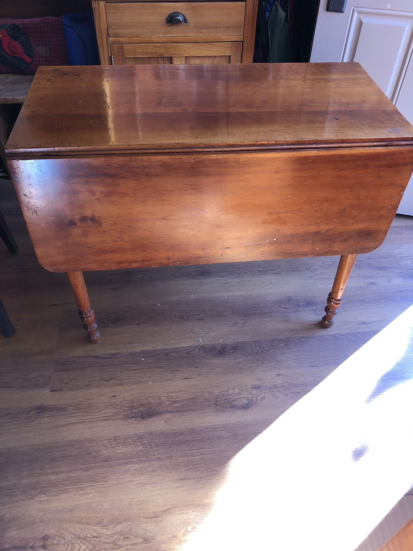 Antique table that coverts to table for 4
