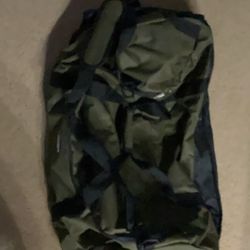 Used Protege 32" Wheeled and Compactible Polyester Rolling Duffel Bag Green.