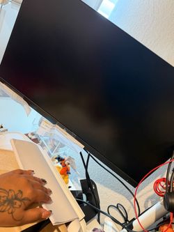 computer monitor setup with an HP mini desktop PC.