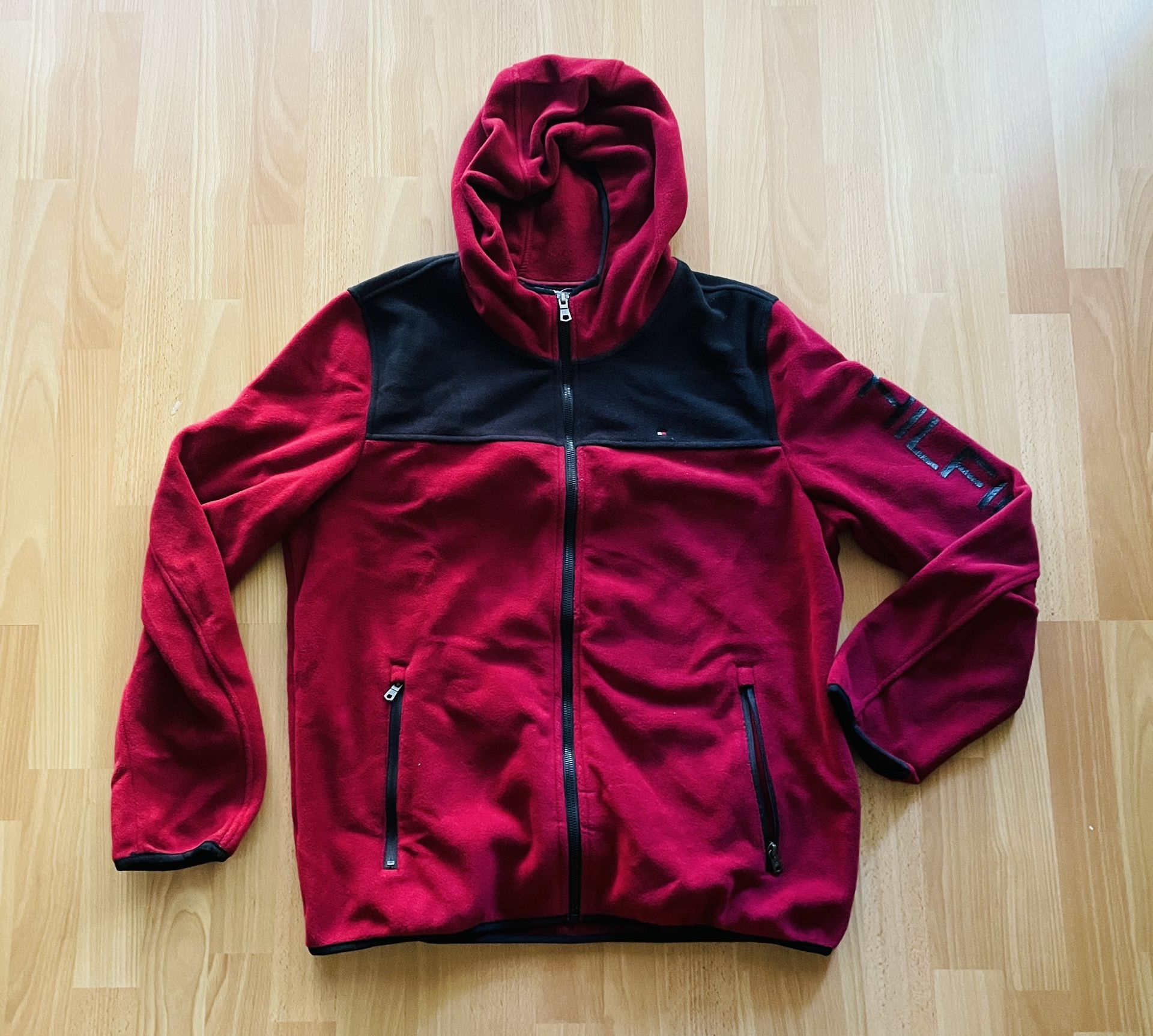 Brand new Tommy Hilfiger Fleece Jacket Large.  BRAND NEW, no tags