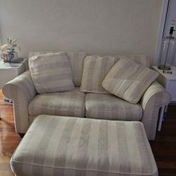 beige striped loveseat with ottoman