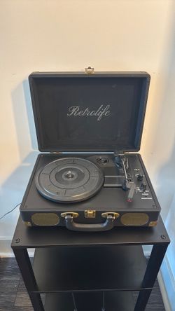 Black record player with stand