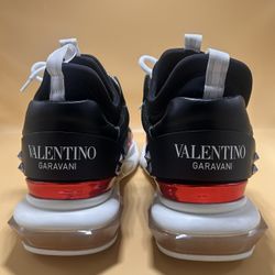 Valentino Bounce Mid-Top in Black/Red/Silver with the signature rockstud heel and icy sole! 