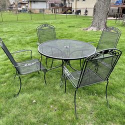 3 wrought iron patio sets, 3 table 12 chairs and 2 seat bench,