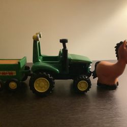 John Deere toy tractor and horse