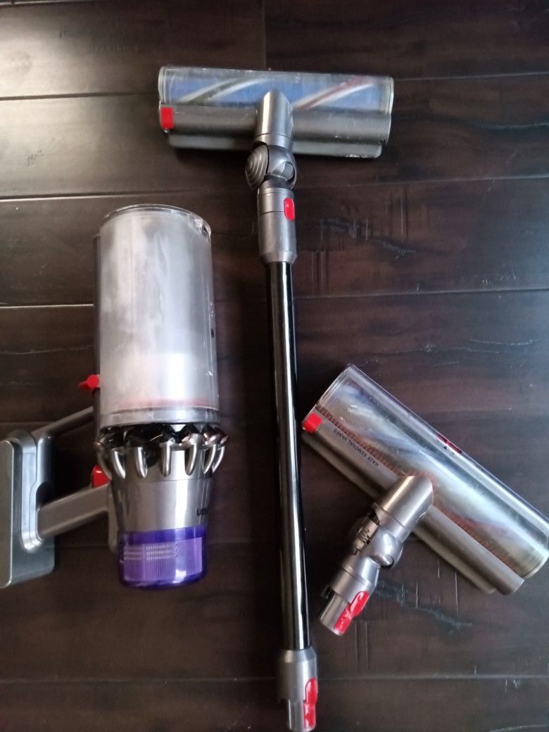 Dyson Outside Vacuum Cordless Includes Power Cable.