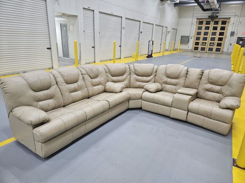 Beige Sectional Recliner With Pull Out Bed