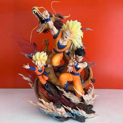 Dragon Ball resin statue features Super Saiyan 3 Goku, Gohan, and Goten surrounding the Shenron dragon.