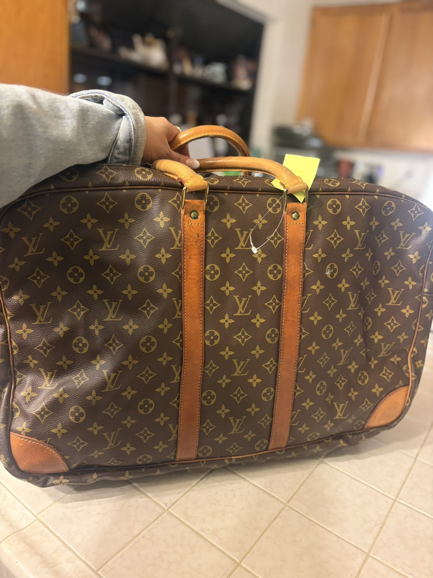 Beautiful vintage luggage by Louis Vuitton three compartments preloaded