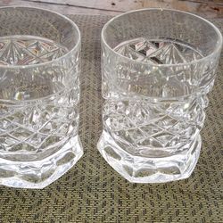 Two beautiful glasses with flared out heavy bottoms