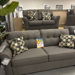 New Sofa And Loveseat Set By Ashley 