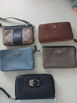 4 Coach & 1 Michael Kors wristlets