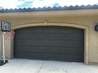 Garage doors with motor and rail