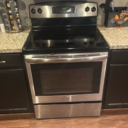 GE Stove And Overhead Microwave 
