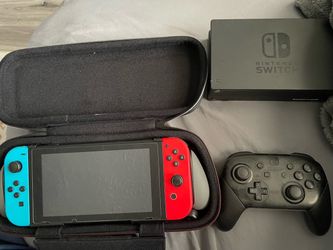 Nintendo Switch + Pro Controller + 4 Games!