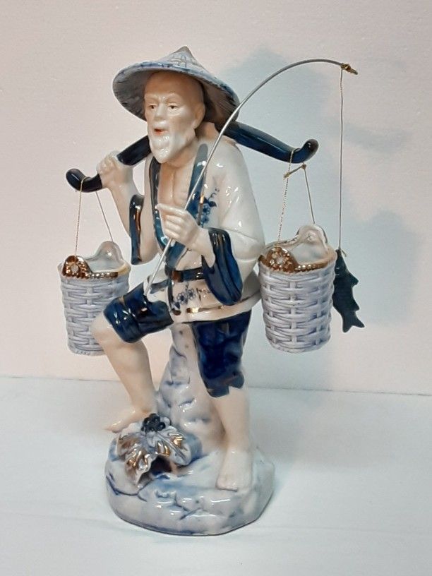 Porcelain Chinese Fisherman Figurine
